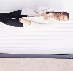 French braids and white sweater