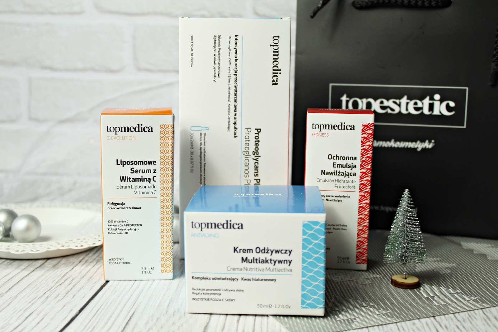 Dermokosmetyki topmedica - krem odżywczy multiaktywny, liposomowe serum z witaminą C, ochronna emulsja nawilżająca i intensywna pielęgnacja przeciwstarzeniowa w kapsułkach | Zuzka Pisze